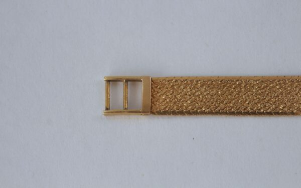 Timeless Antique AIWA Gold Watch 18kt with Textured Bracelet, Quartz Movement & Roman Numerals - Image 5